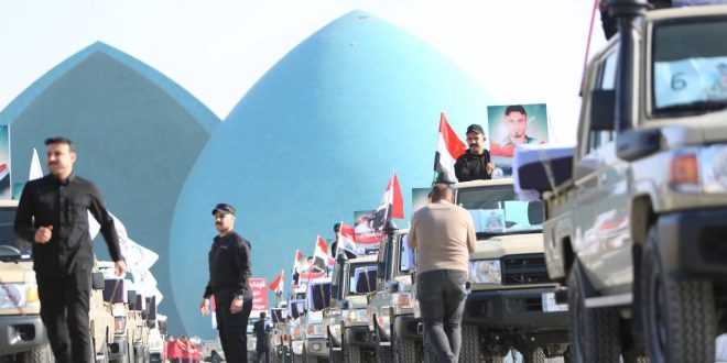 25 نعشا رمزيا “حشديًا”.. مسيرة التشييع الرمزي لشهداء العدوان الأميركي في نصب الشهيد